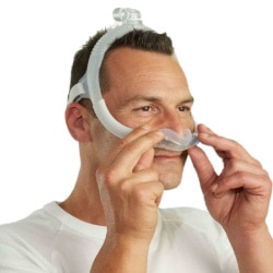 Man wearing Nasal Cradle CPAP Mask